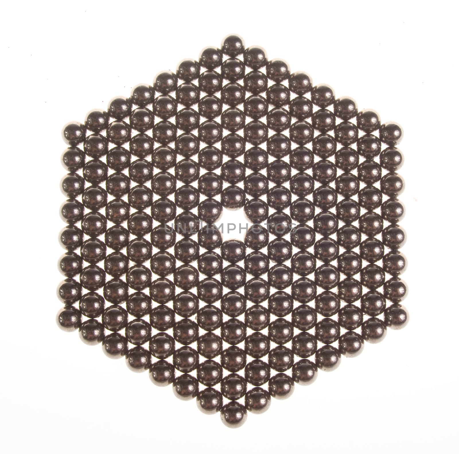 Hexagon of small metal balls on the white background by BIG_TAU