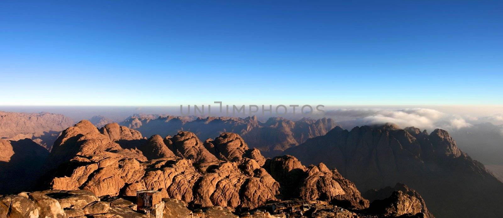 Two shadows in the Mont Sinai in Egypt early in the morning with sunrise