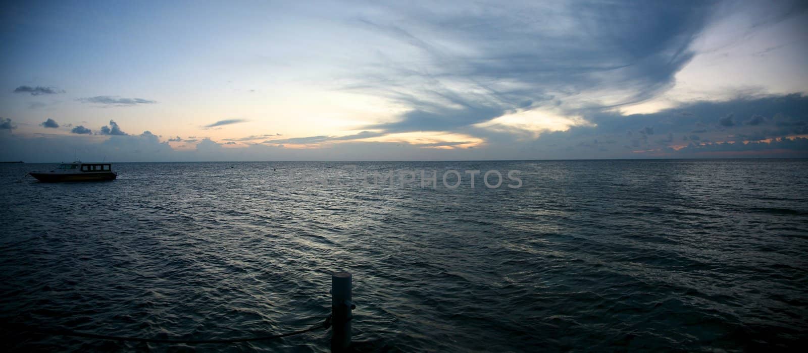 Sunset on the Indian Ocean in the Maldives - Embudu island