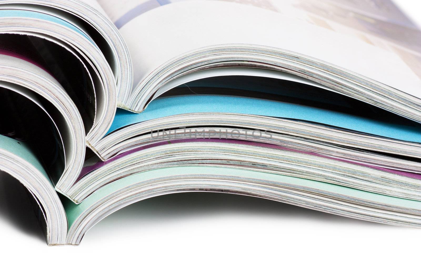 Selective focus image of a stack of magazines