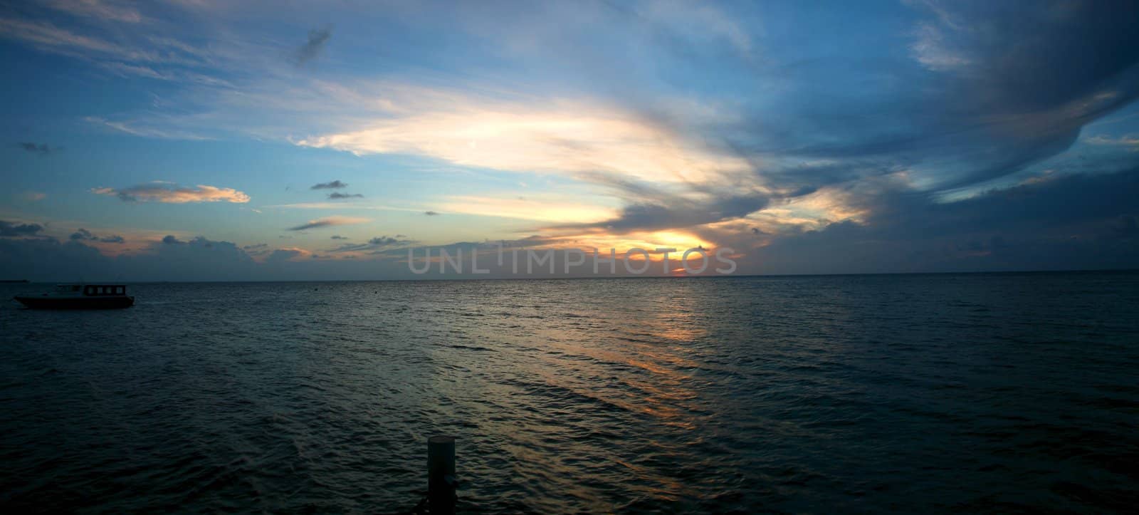 Sunset on the Indian Ocean in the Maldives - Embudu island