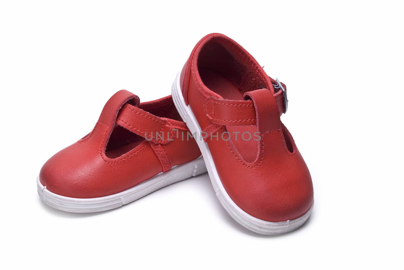 Shoes for kids isolated over a white background.