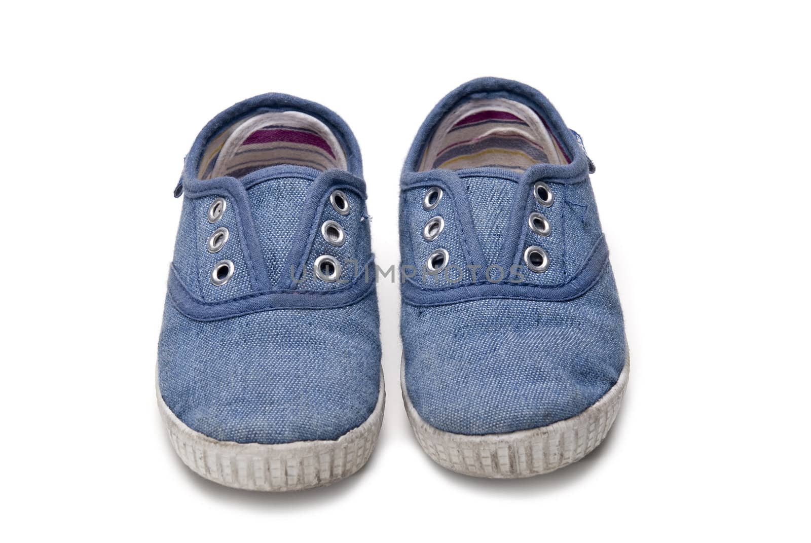 Shoes for kids isolated over a white background.