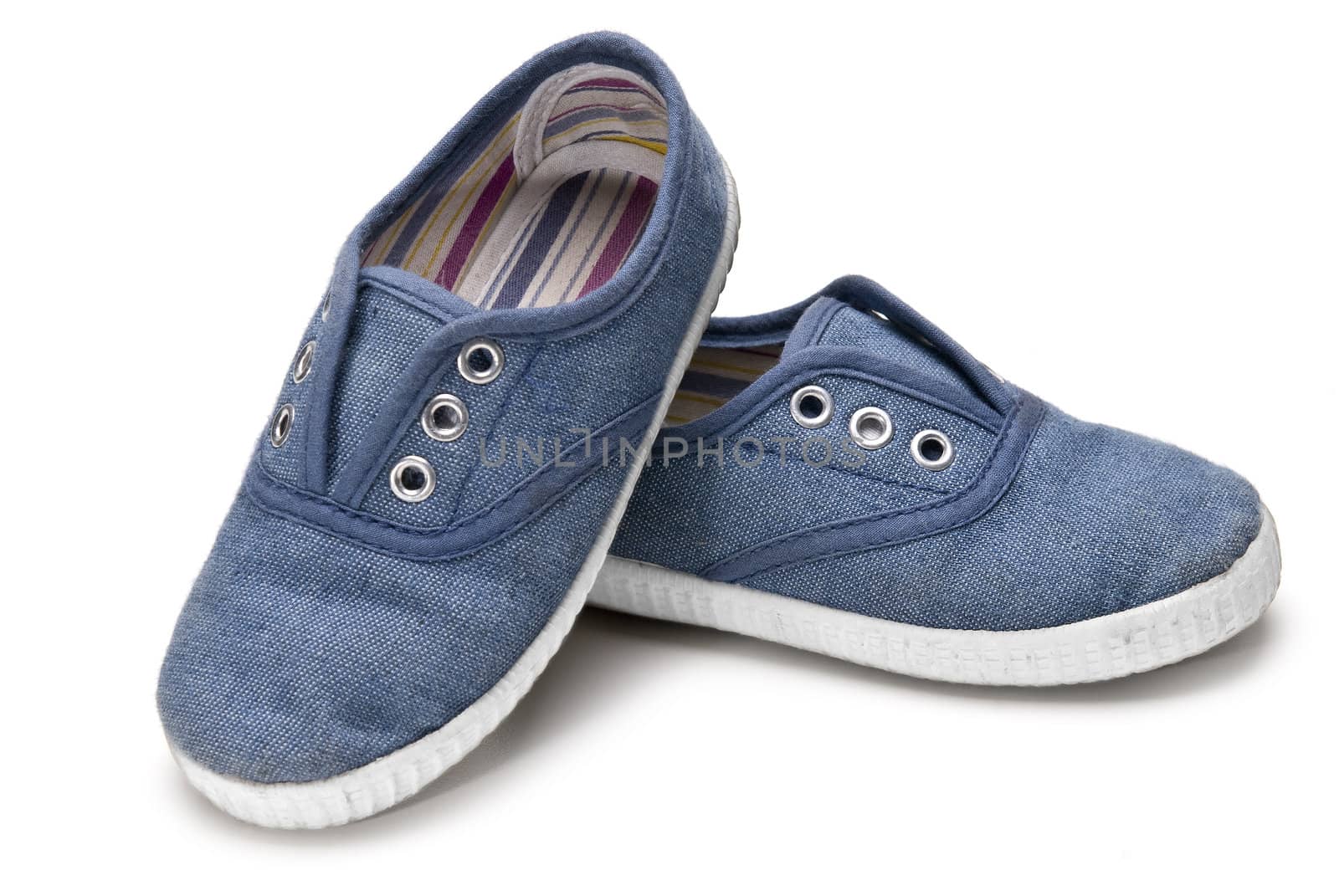 Shoes for kids isolated over a white background.