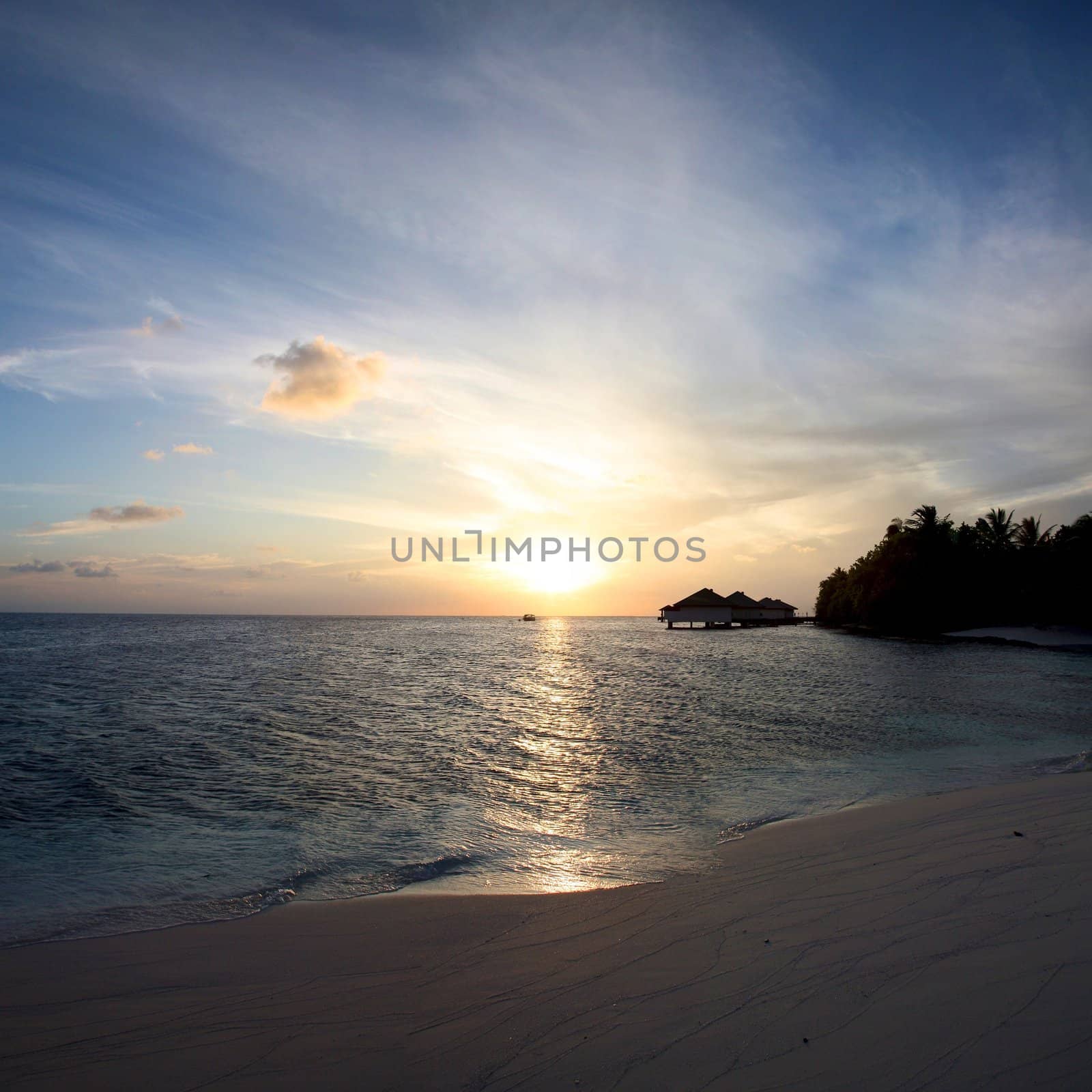 Sunrise early in the morning on the beach of Embudu in the Maldives