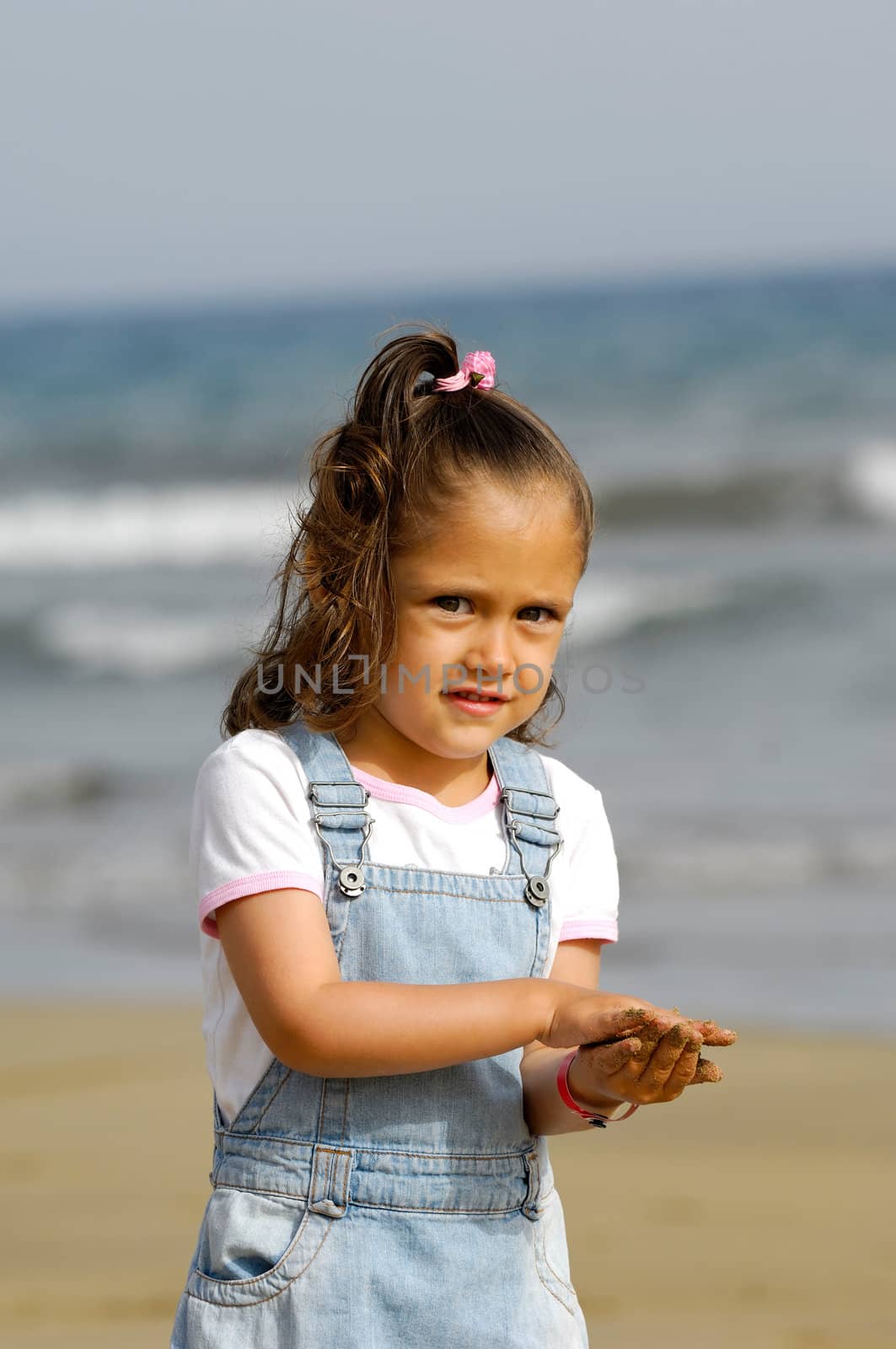 Portrait of child on the beach.