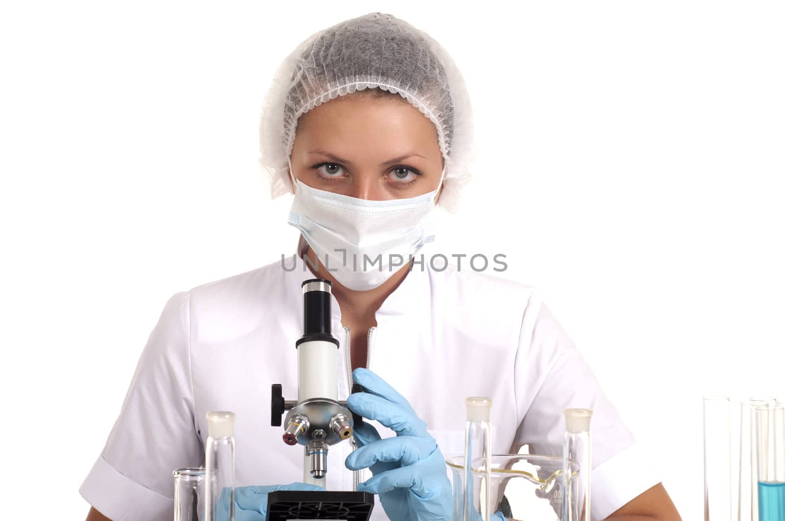 young beautiful woman scientist works in lab