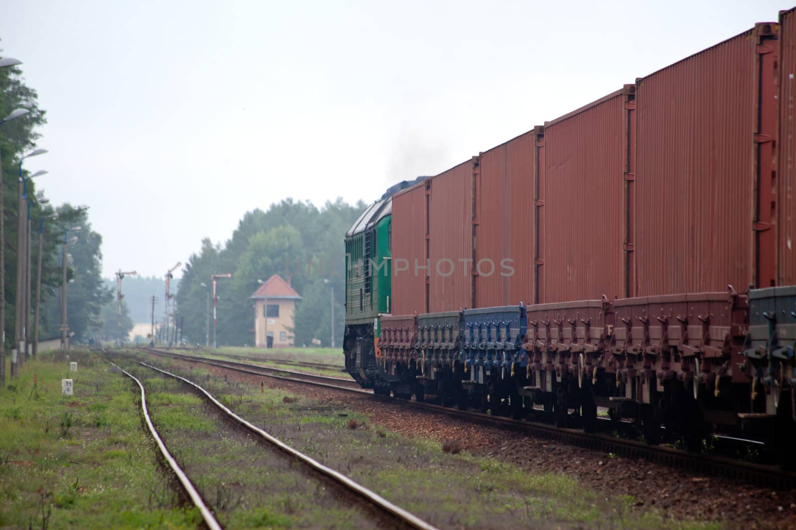 Container train passing through the station
