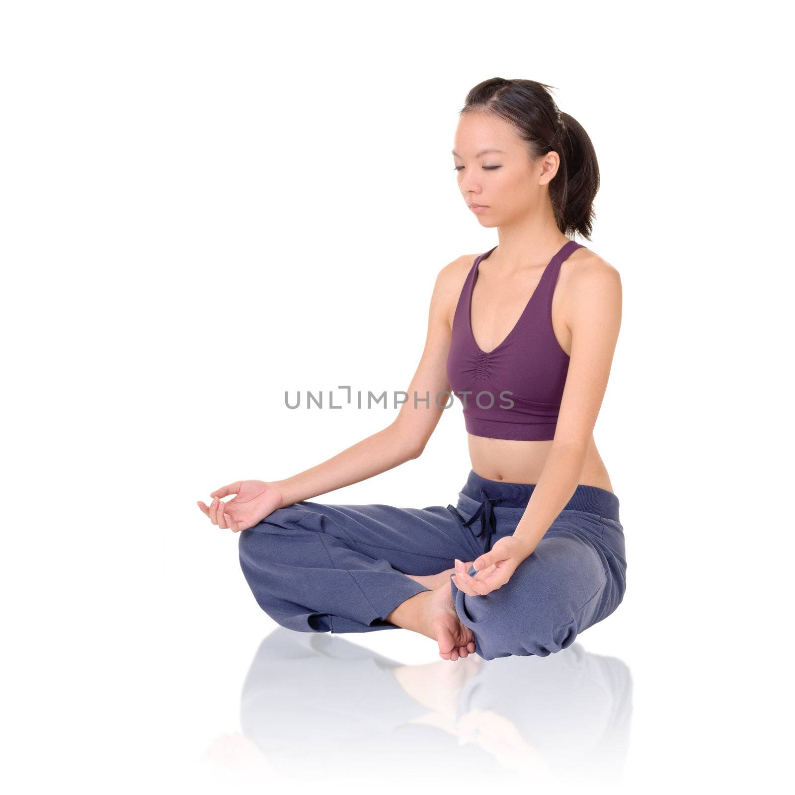Yoga exercise on ground by Asian girl of fitness, full length portrait isolated on white background.