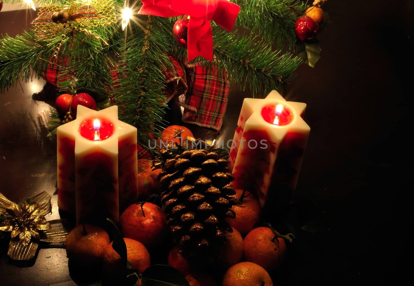 Christmas candles and decoration on the table