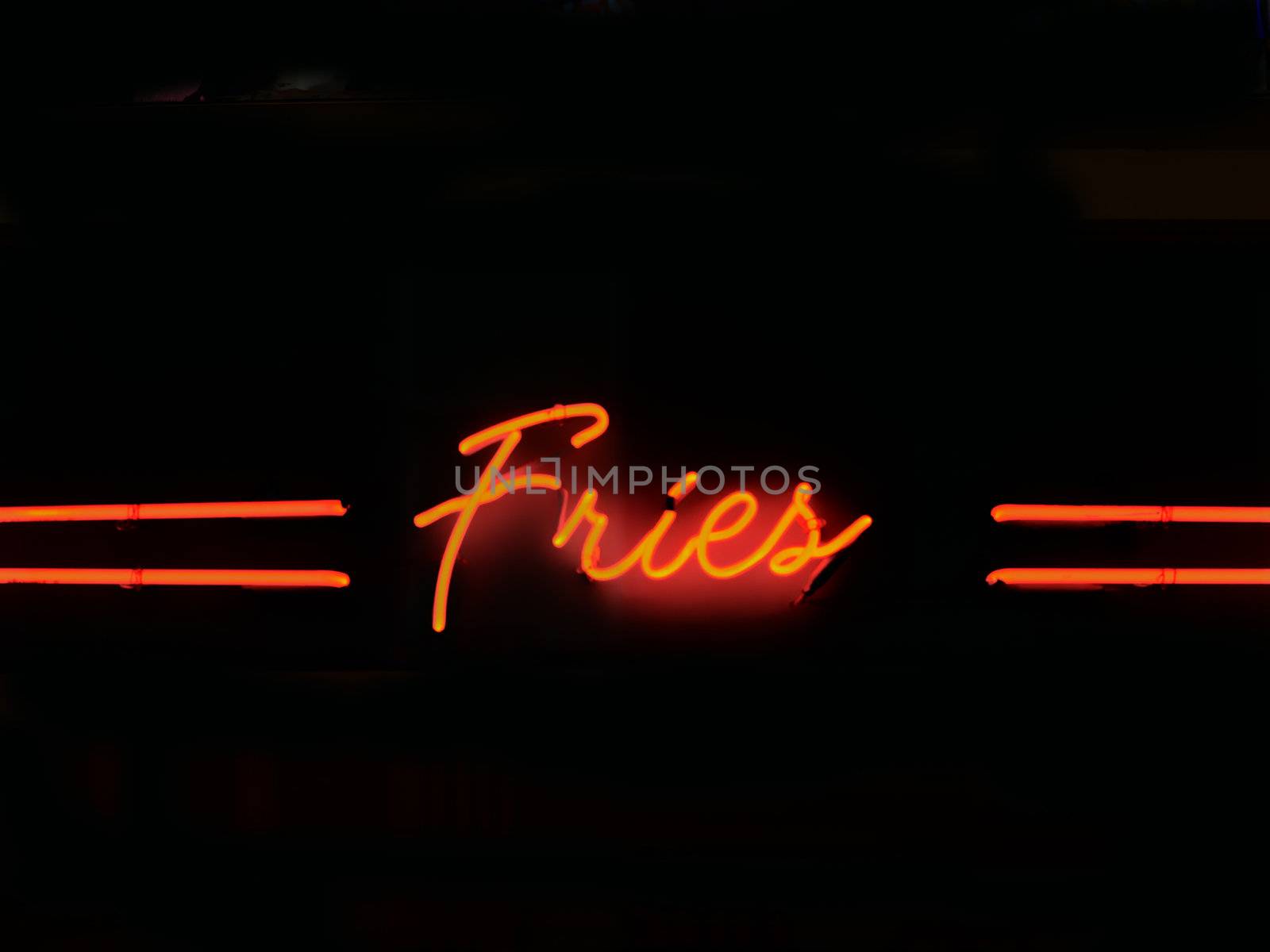 close up of fries neon sign