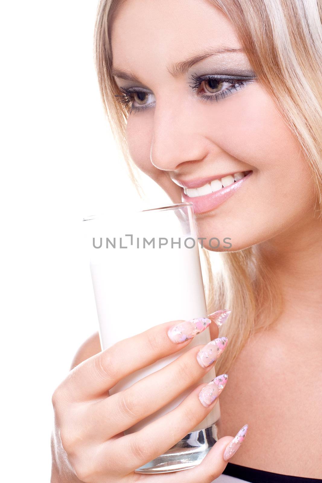 beautiful woman drinking milk on a white background