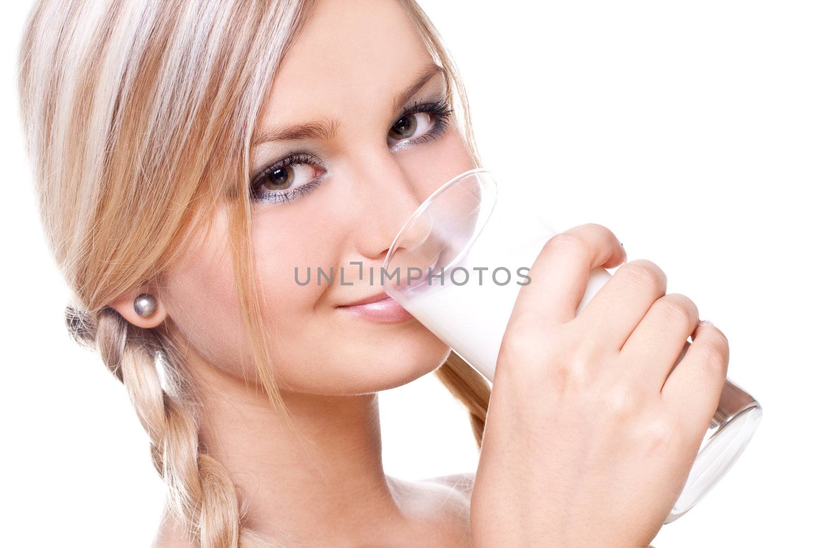 beautiful woman drinking milk on a white background