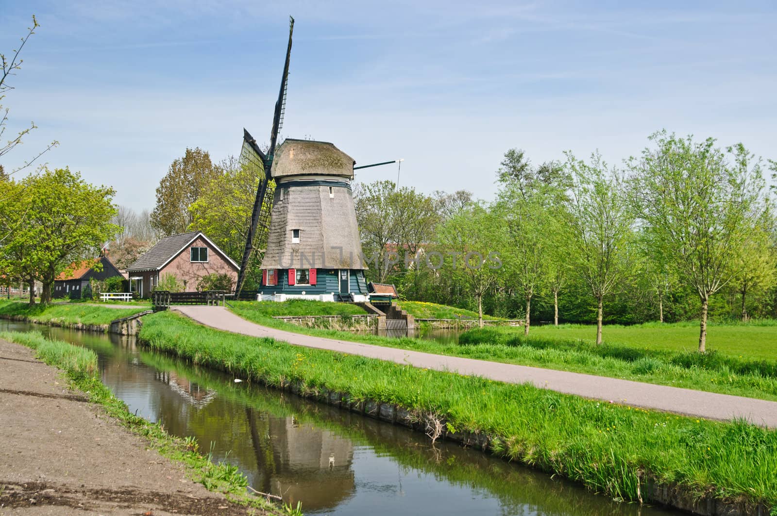 Traditional Dutch A water wind mill, spring, Holland