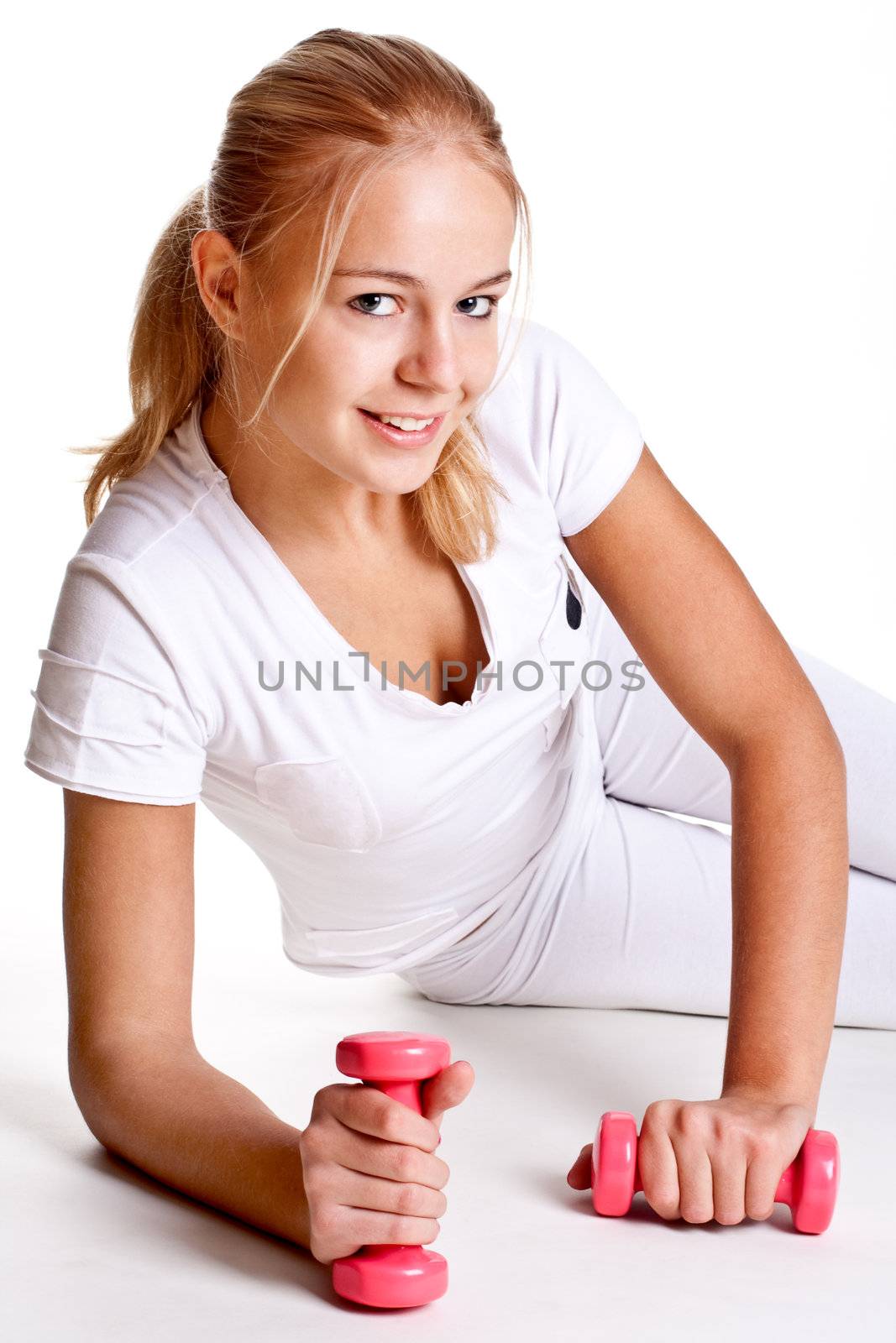 pink dumbbells in the hands of women by Lupen