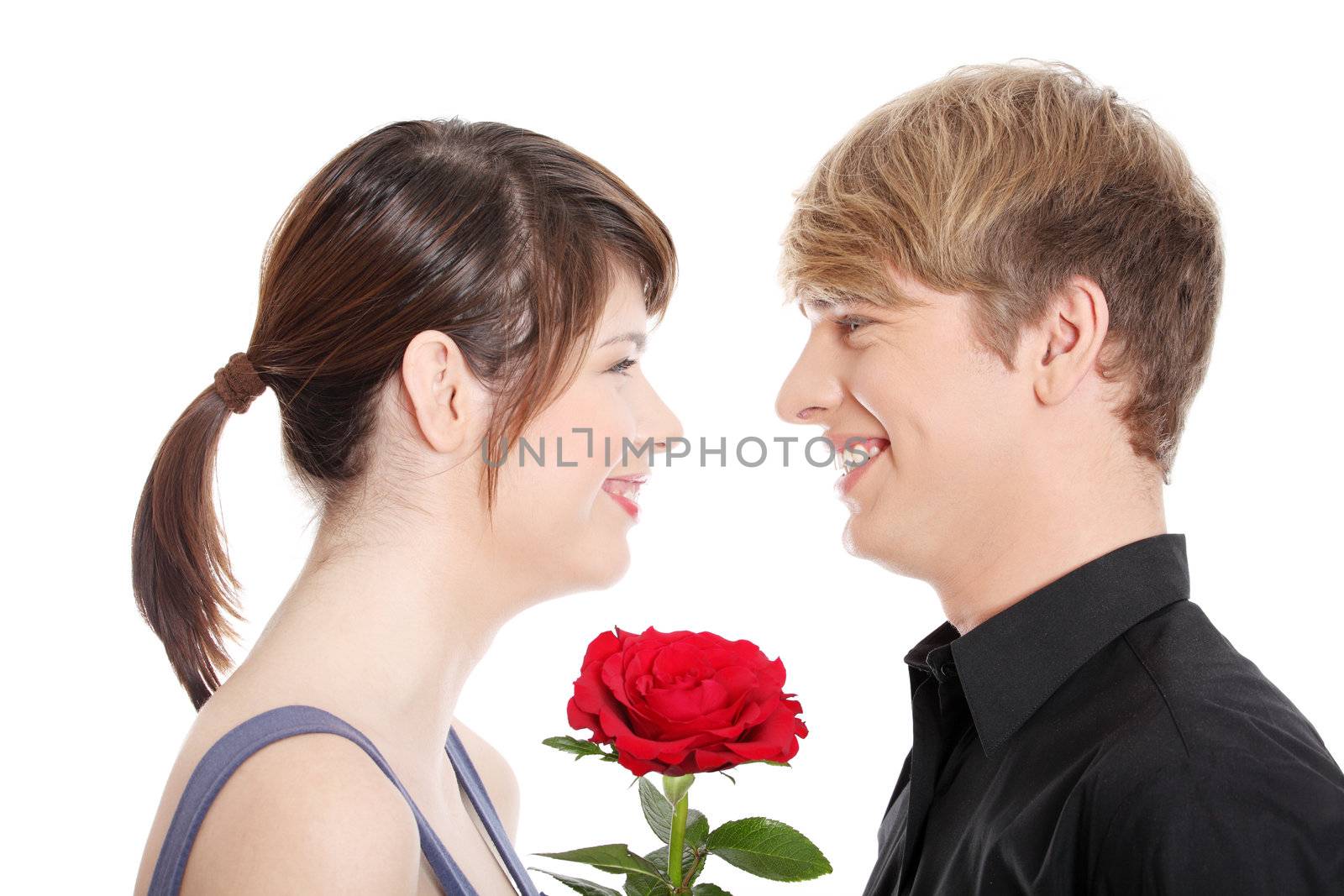 Young couple and rose. Isolated won white background.