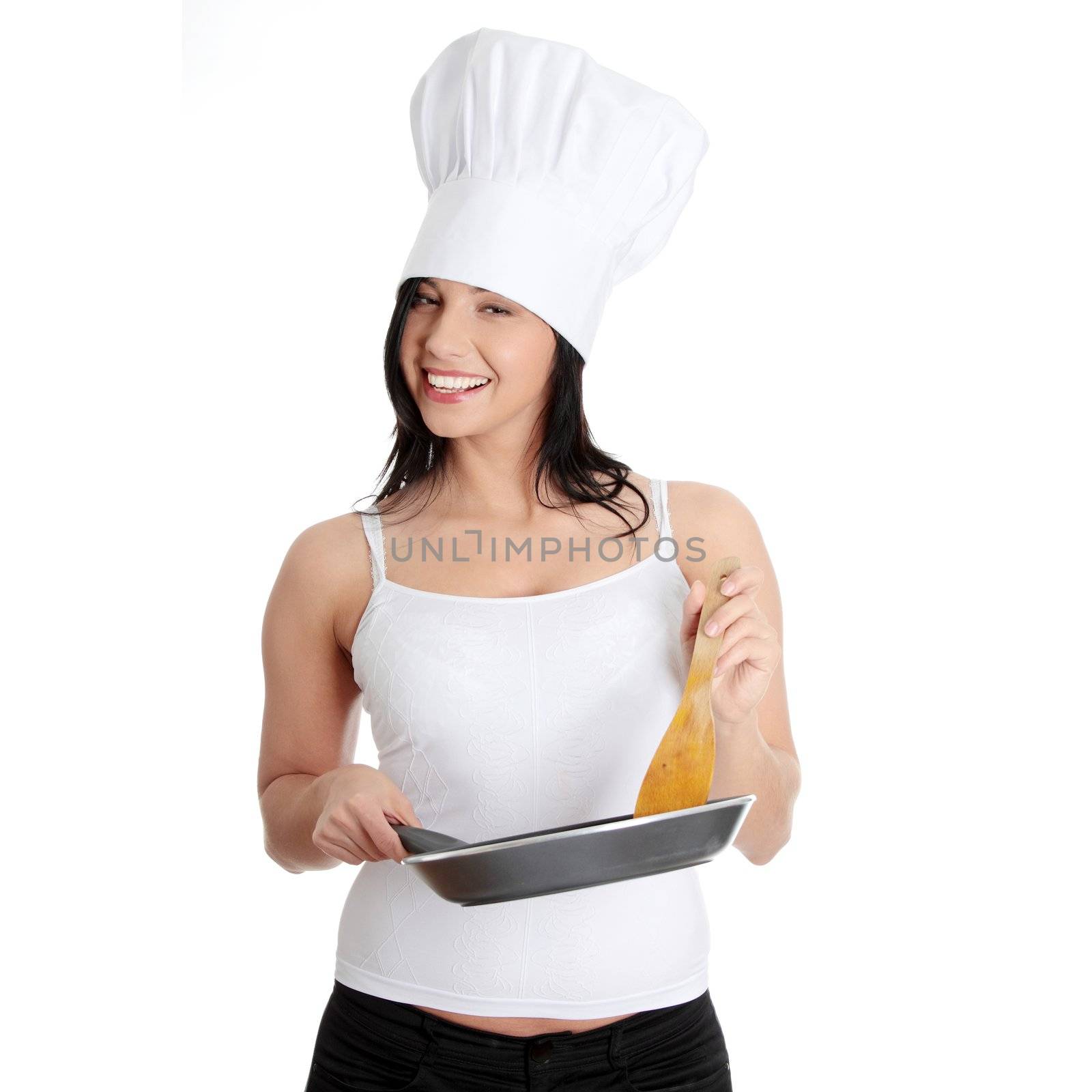 Young woman cooking healthy food by BDS