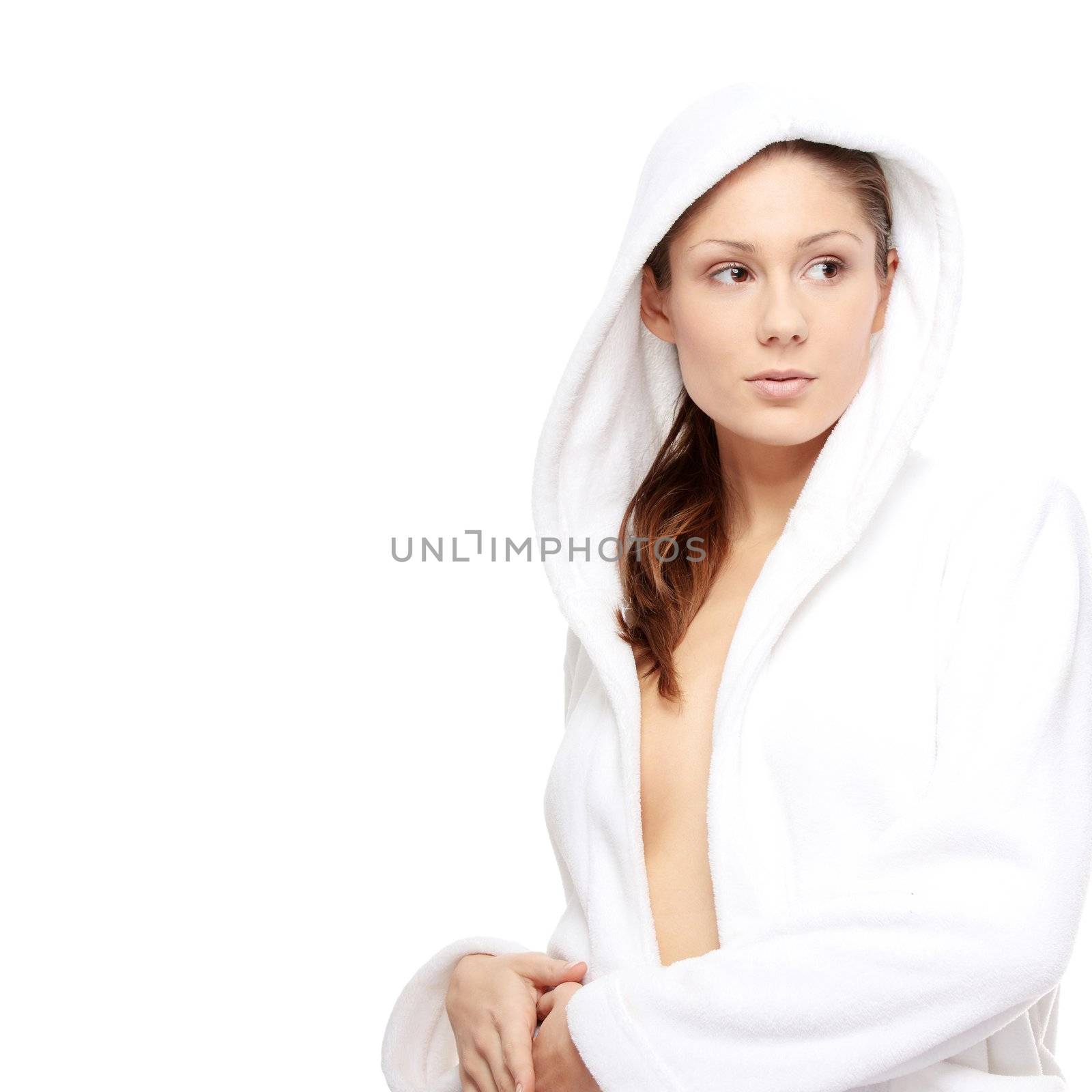 Young beautiful woman in bathrobe, isolated on white