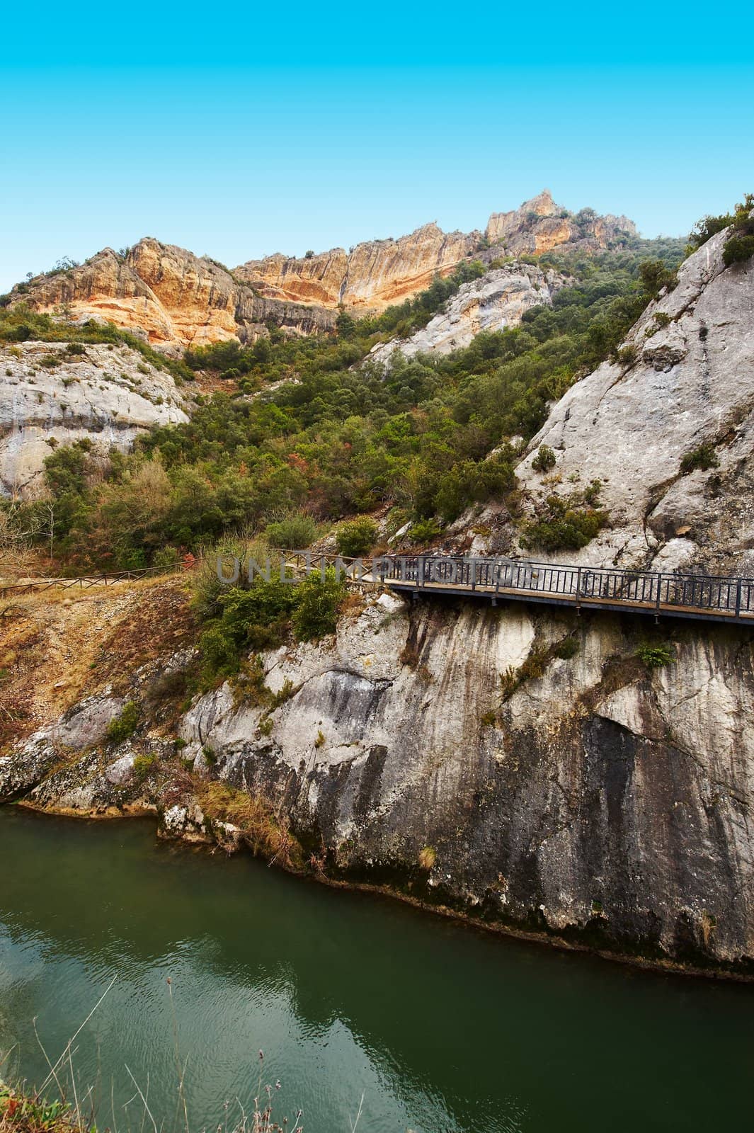 Mounted on the Rocks Wooden Bridge over the River Aragon