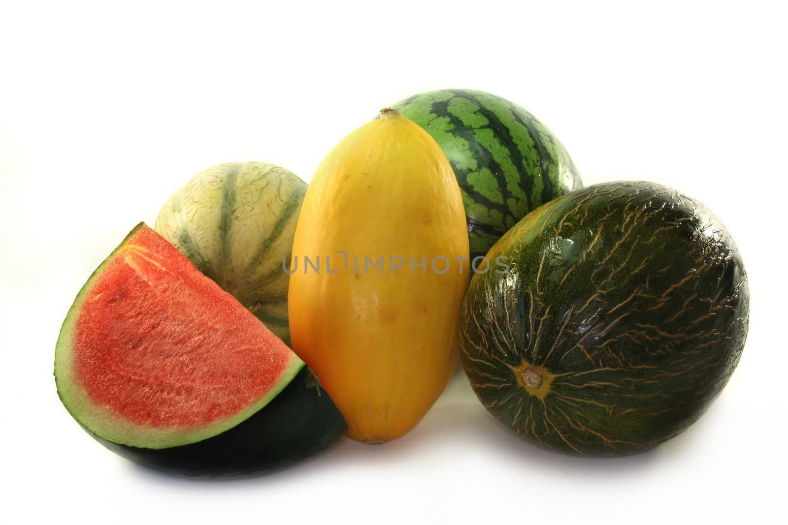 different varieties of melon on a white background