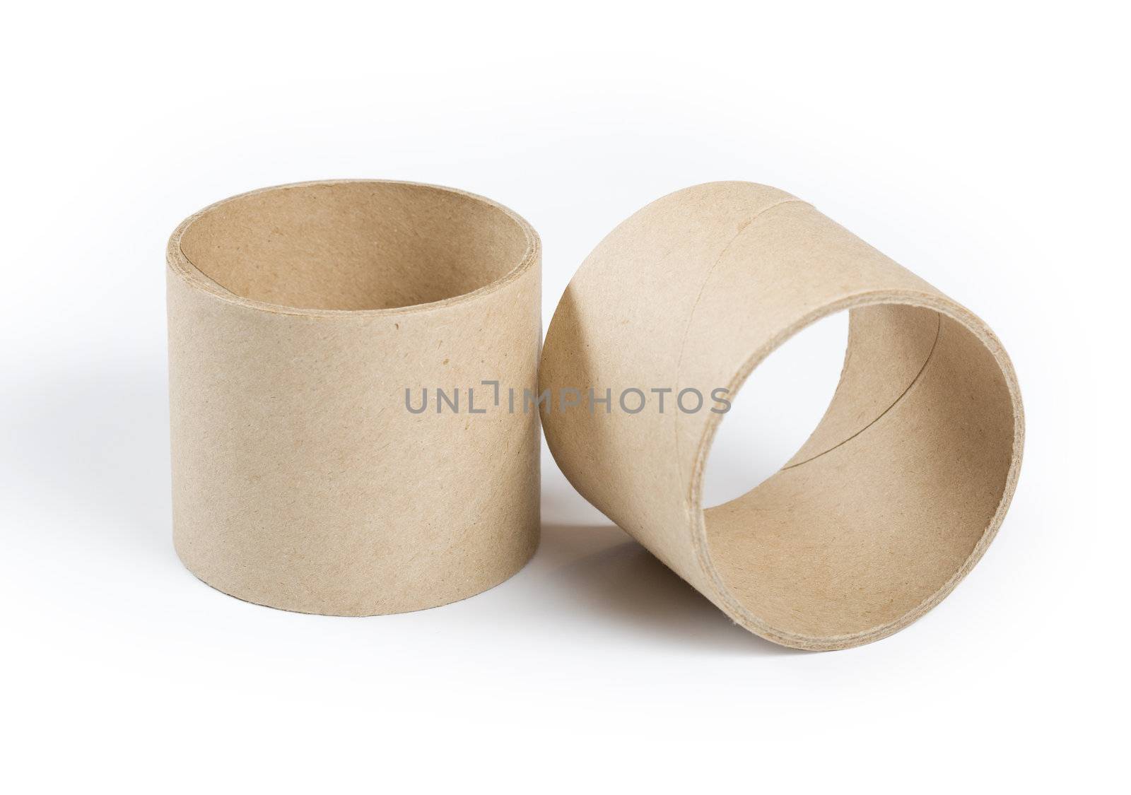 Cardboard cylinders on a white background
