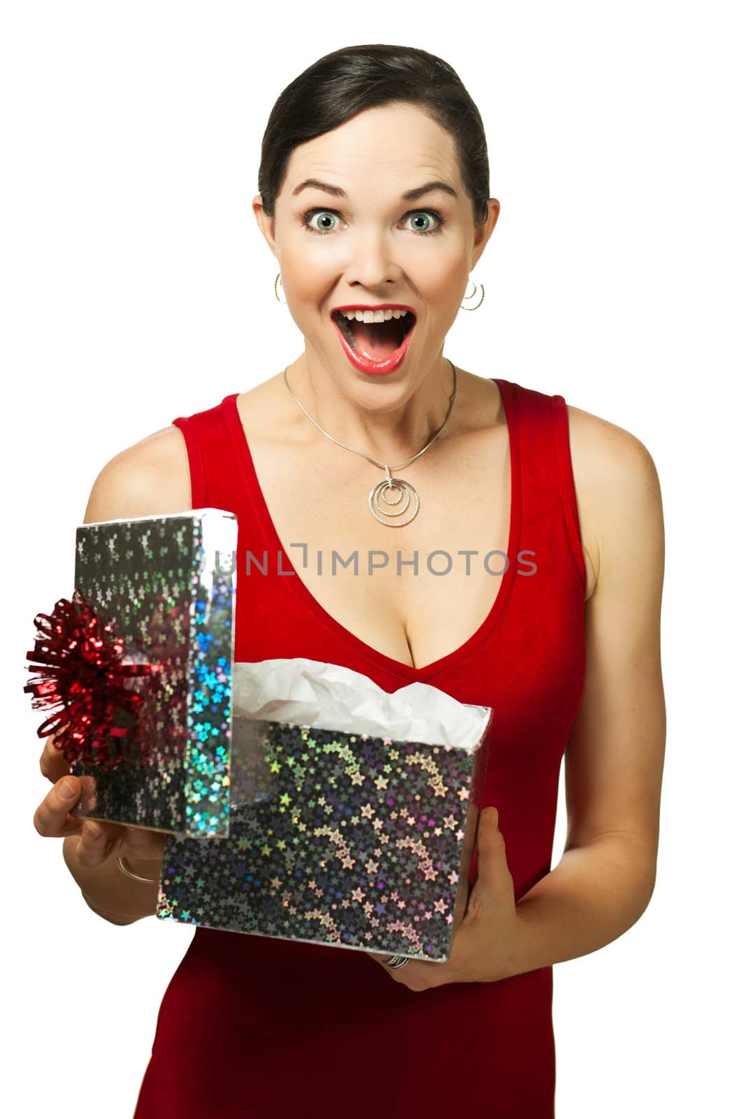 Beautiful young woman opening gift box looking very excited
