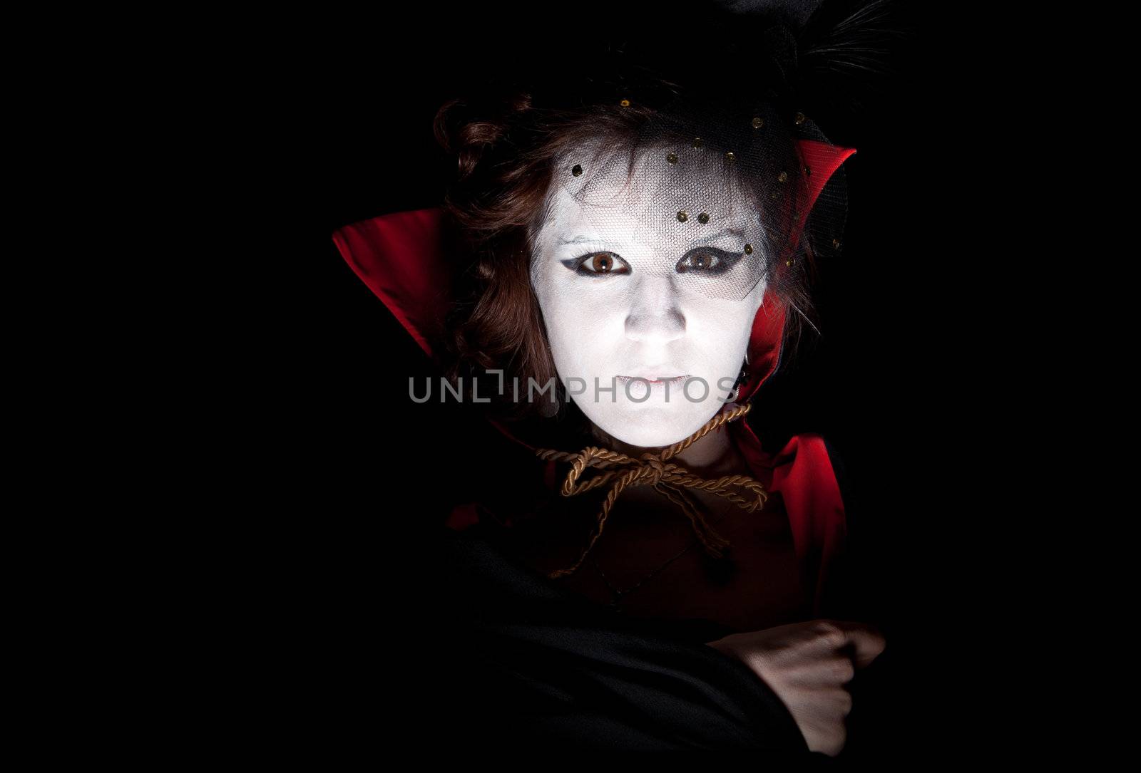 closeup portrait of a young female vampire