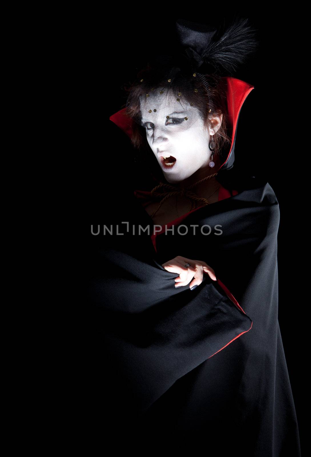 a portrait of a young female vampire