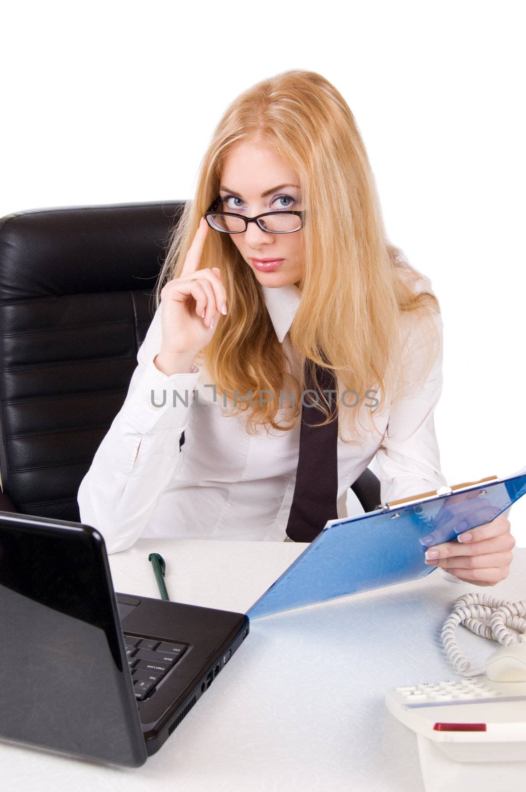 Seductive businesswoman in glasses near laptop over white