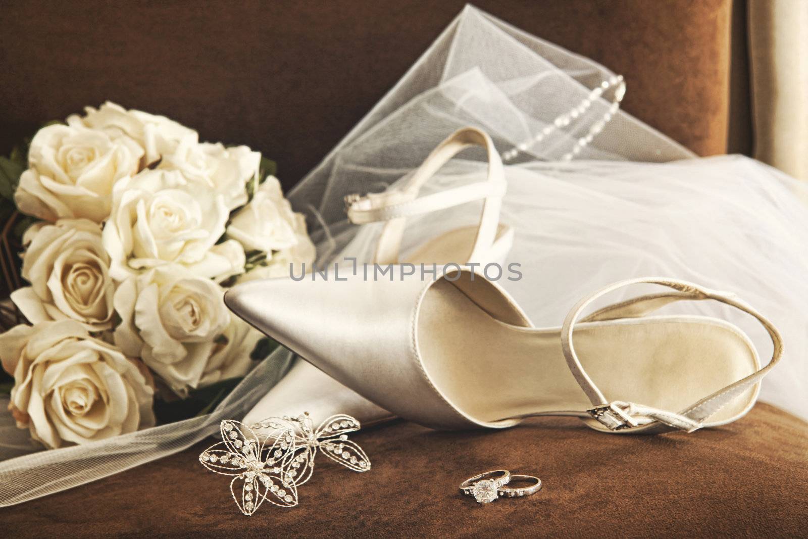 Wedding shoes with bouquet of white roses and ring  by Sandralise