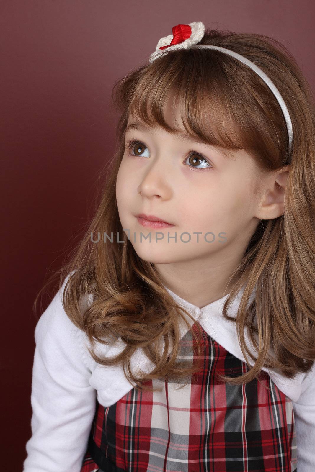 Beautiful little girl wearing a head band