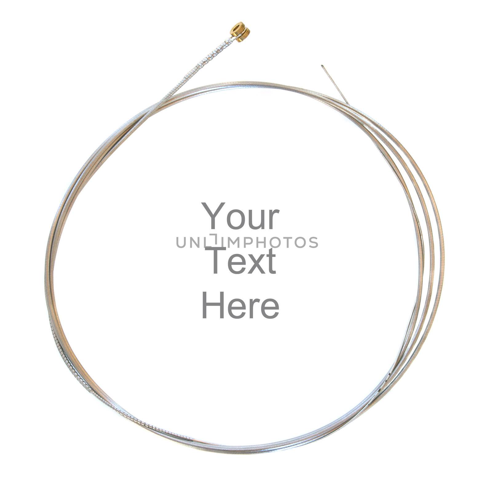 A single coiled flat wound electric guitar string.  Use it as a frame/border or remove the text for a close up of the string.