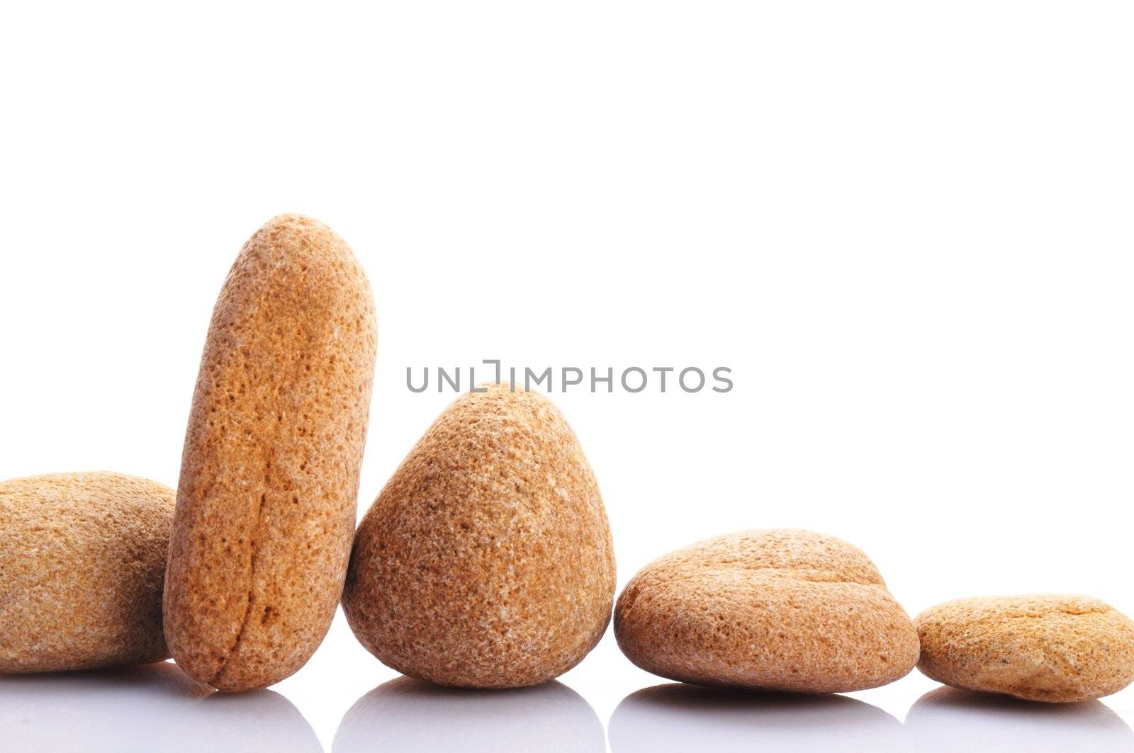 zen stones or spa still life isolated on white showing harmony with copyspace