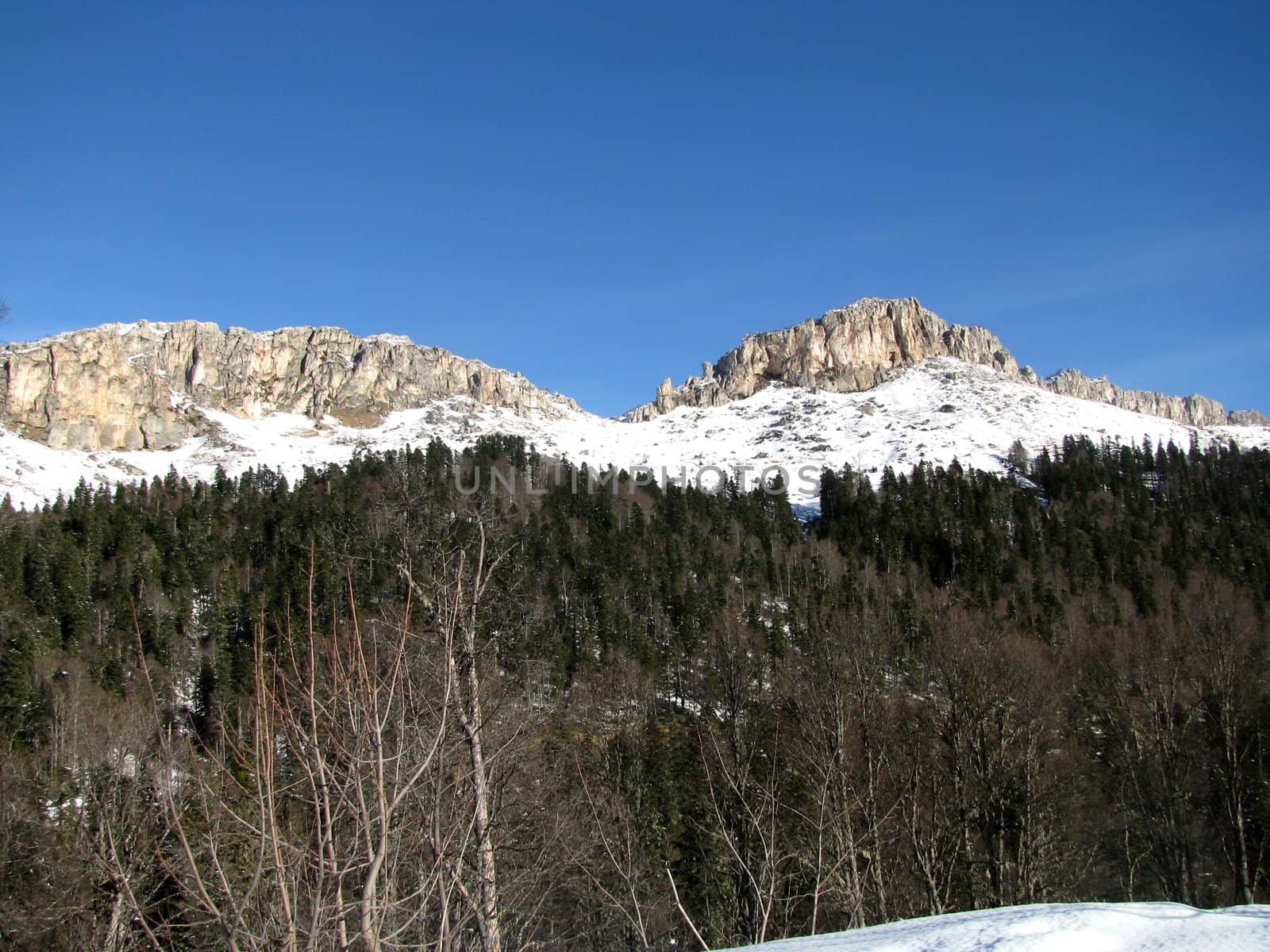 The main Caucasian ridge; rocks; a relief; a landscape; a hill; a panorama