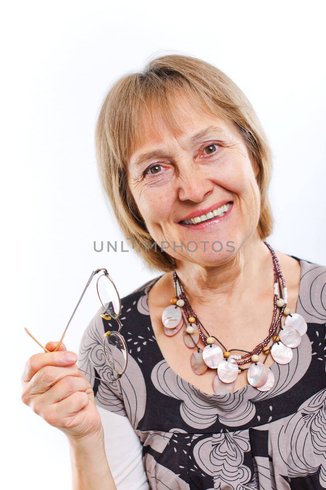 Portrait of a happy aged woman smiling