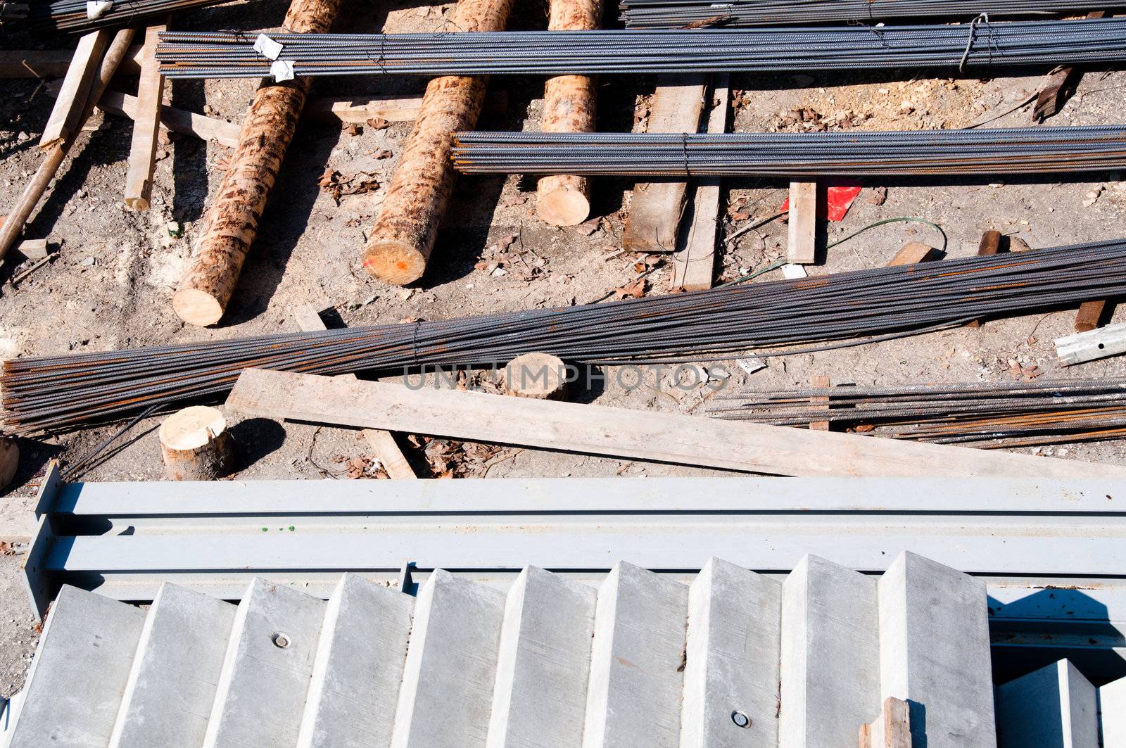 Concrete stairway, wood and iron materials in a construction site