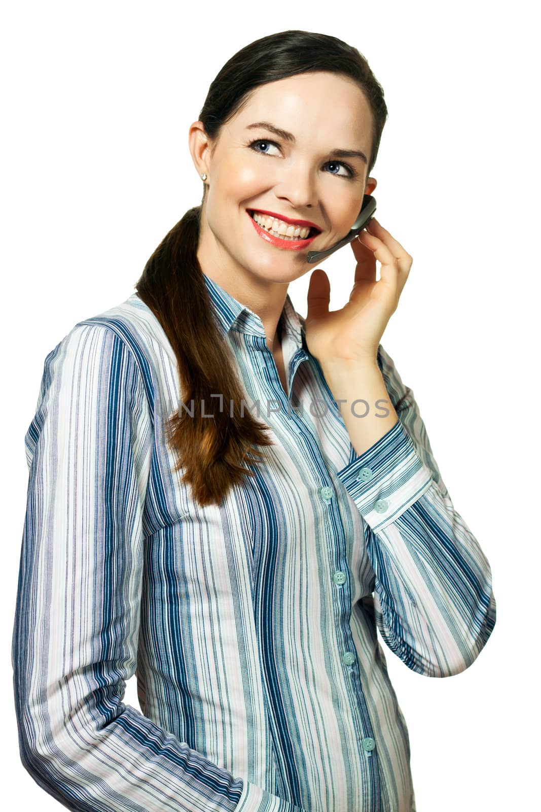 Isolated portrait of an attractive, young, smiling customer service representative  with a head set