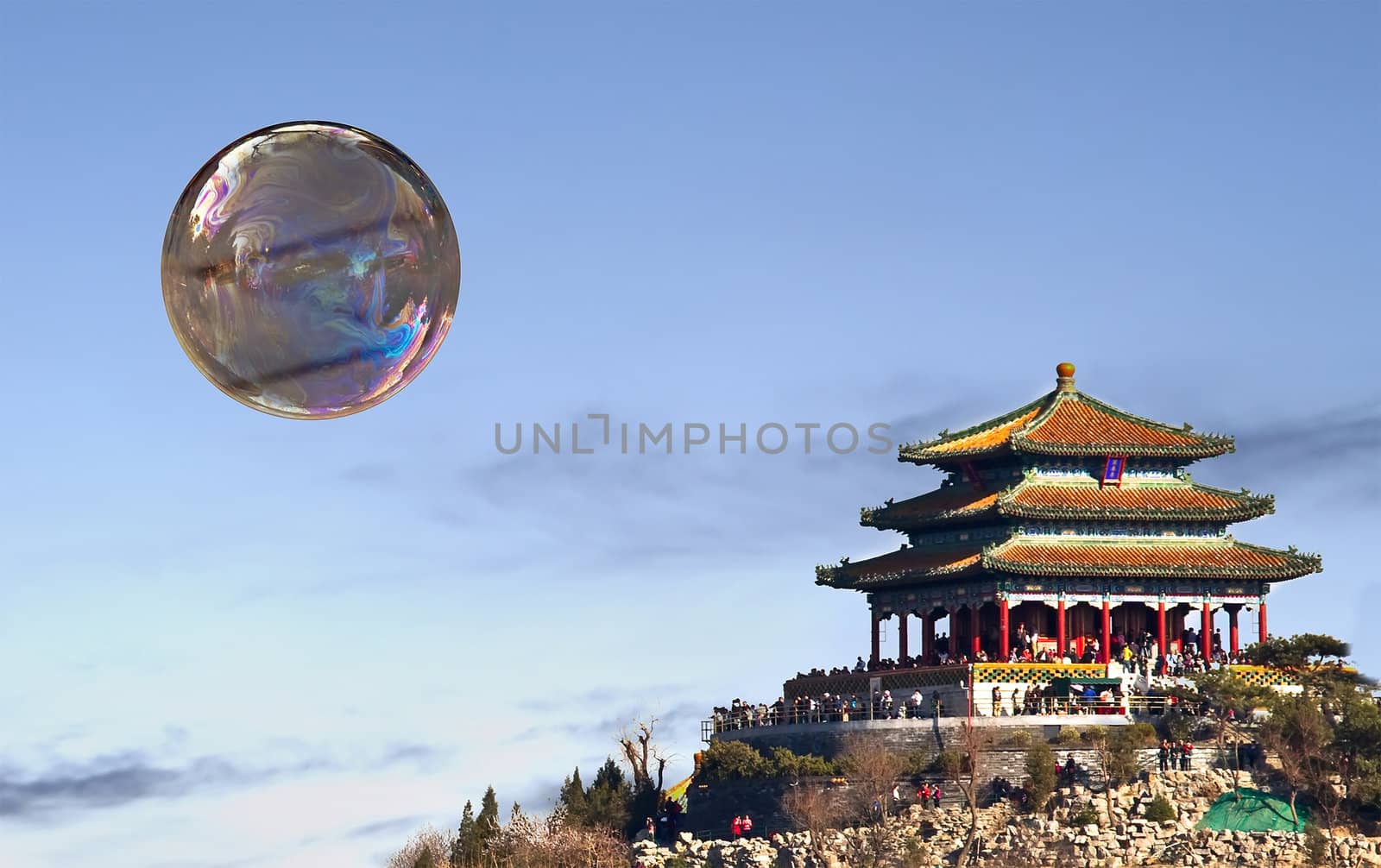 Taken in the morning of soap bubble flying in the sky which looks as if it flies over the ancient building