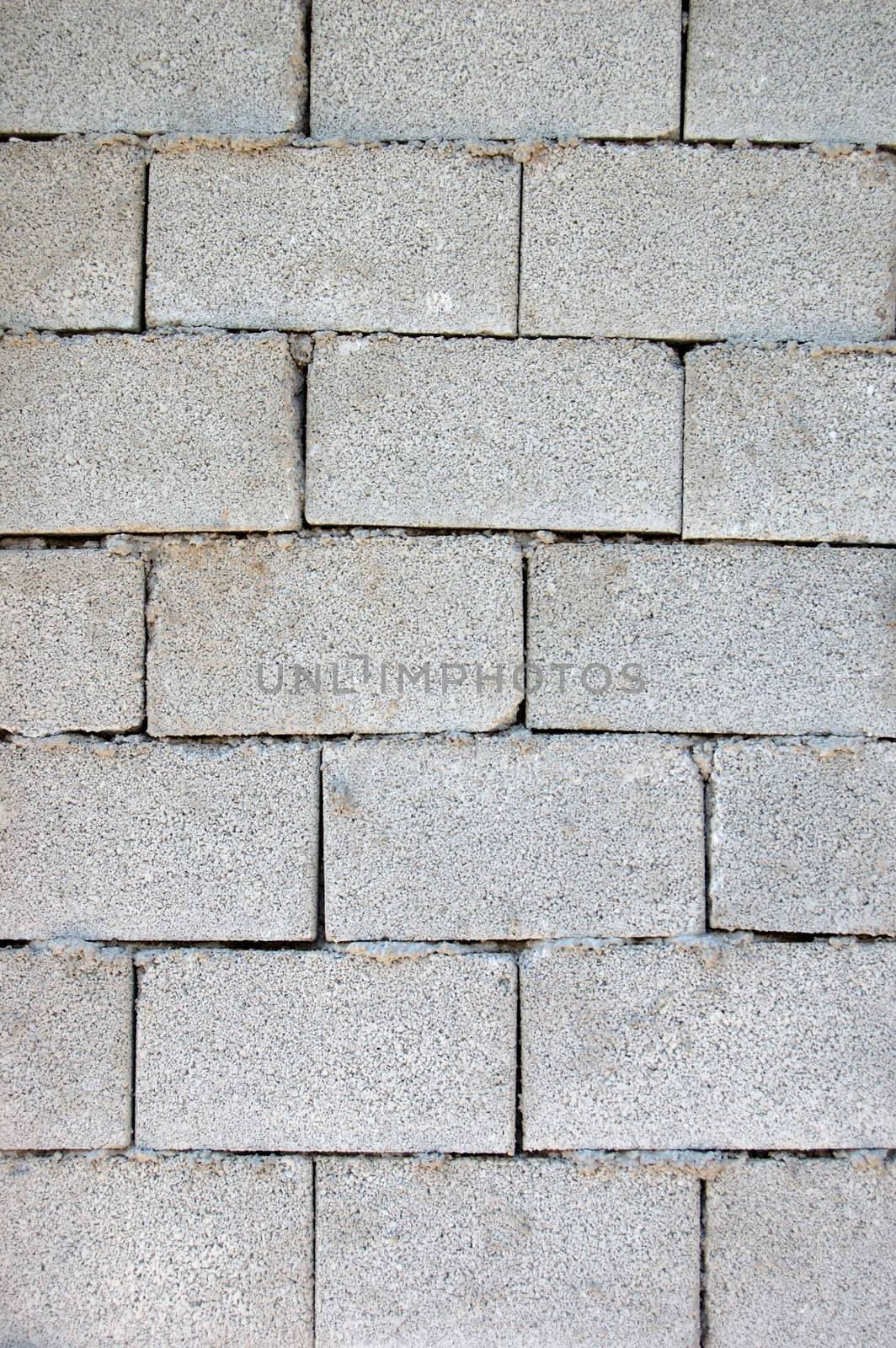 Cinder block brick wall texture background pattern.