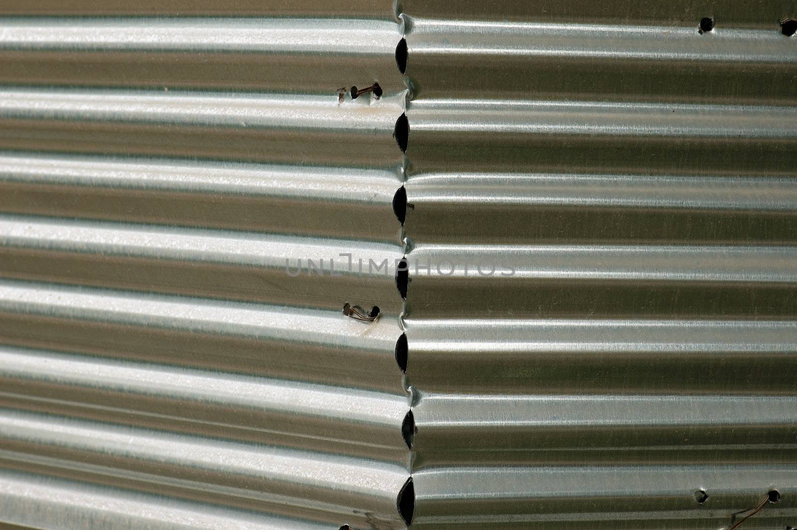 Corrugated sheet metal fence. Abstract industrial background.