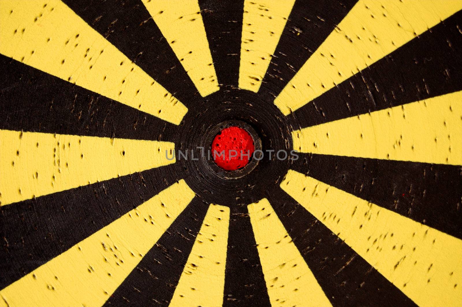 Old dartboard target detail. Abstract background pattern.