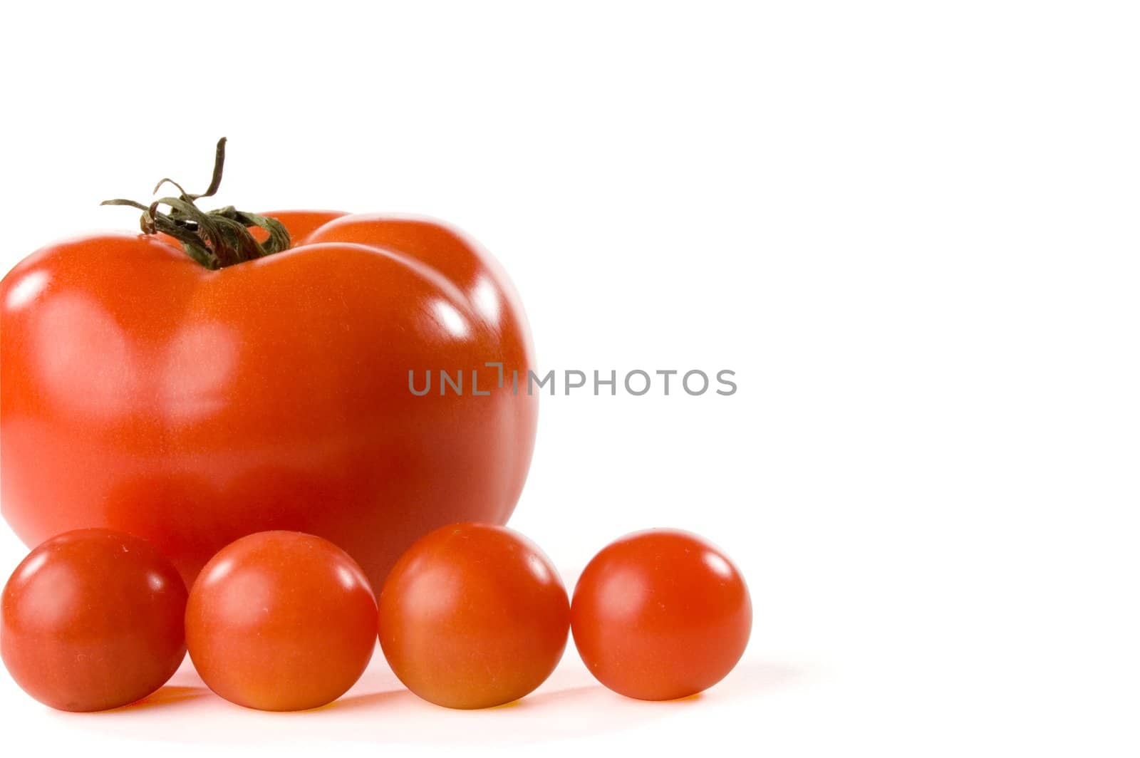 Five red tomatoes on white background
