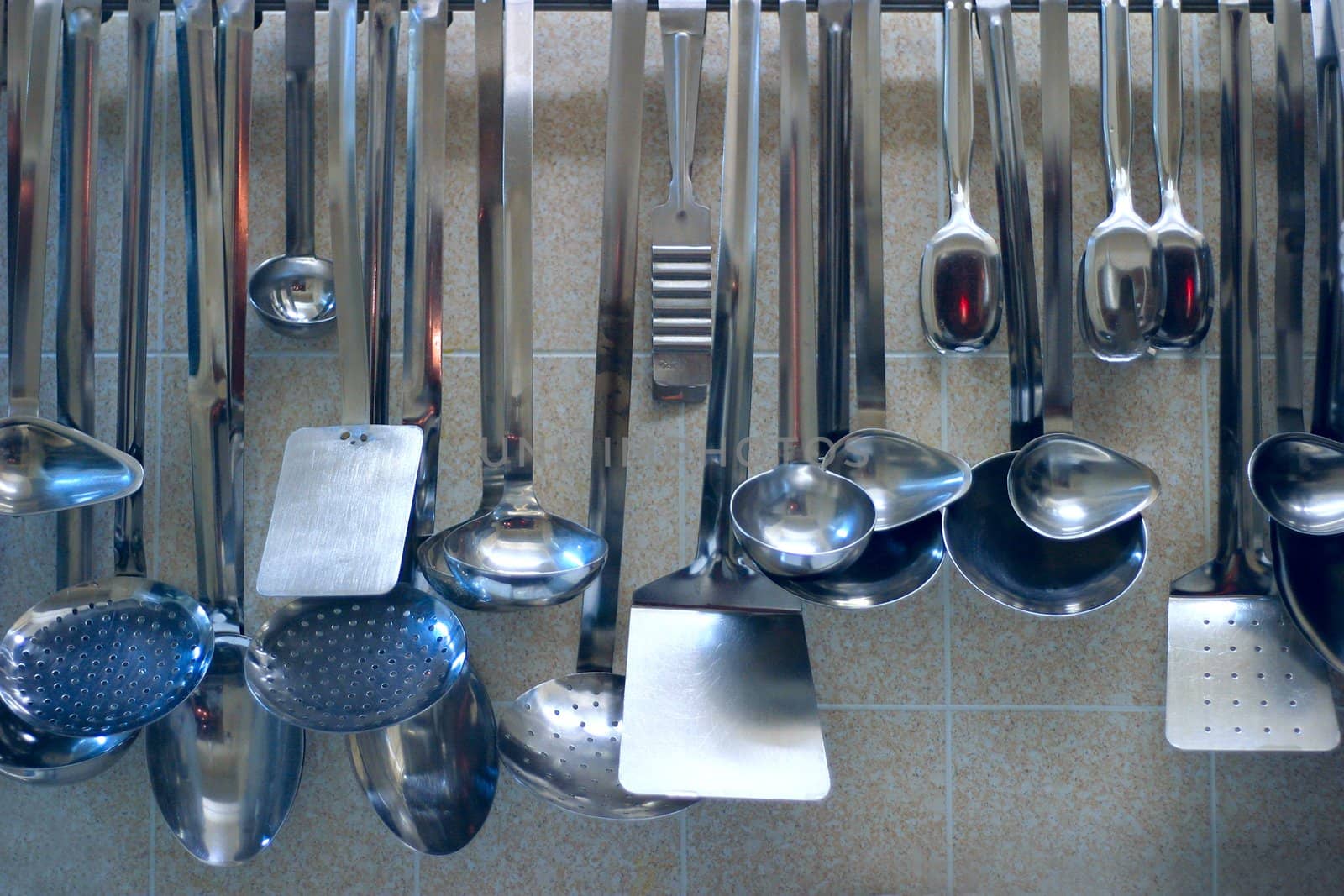 Many different tools for preparation of food at restaurant