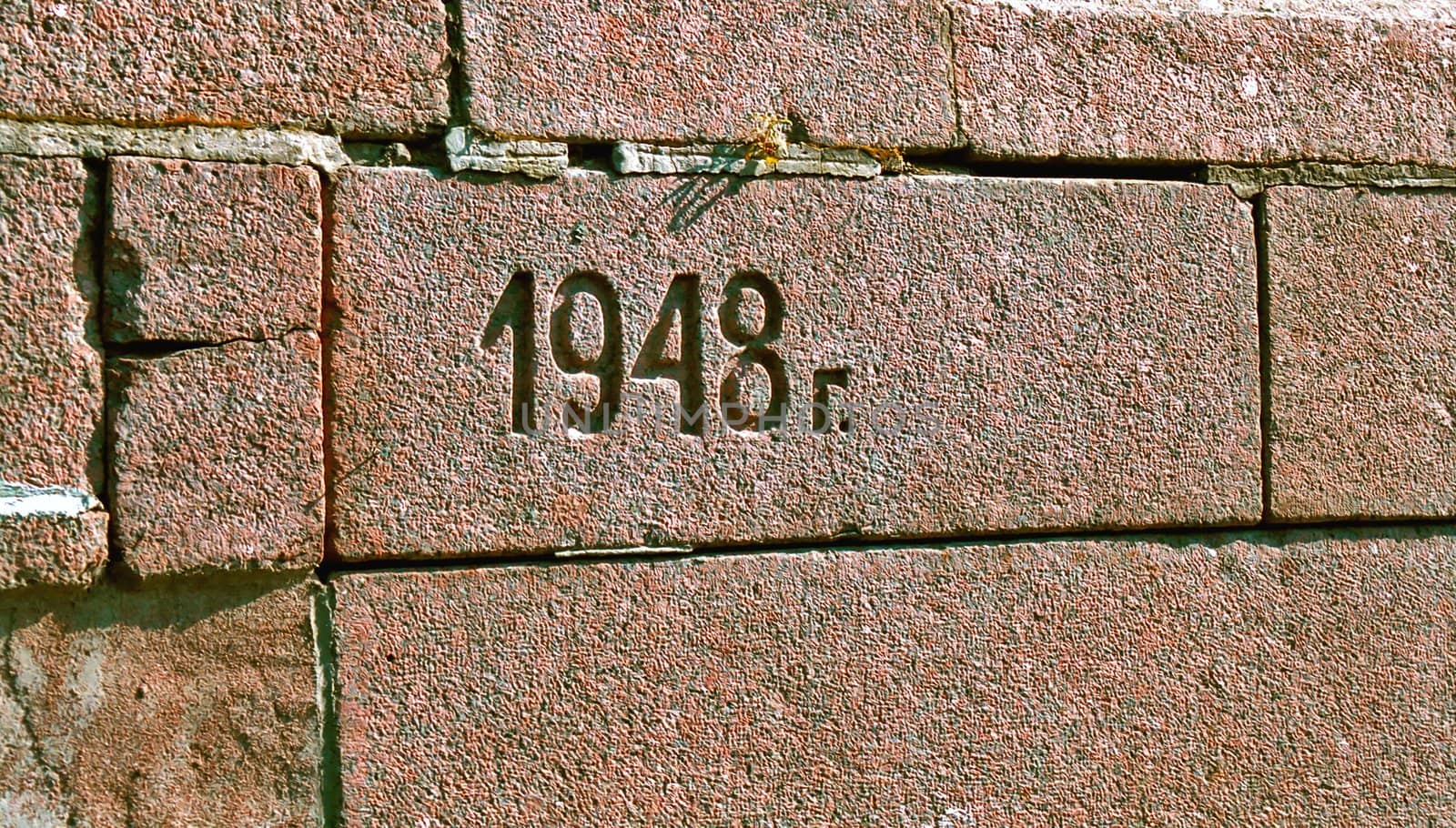 Engraving stone of the wall with the mark of 1948 year