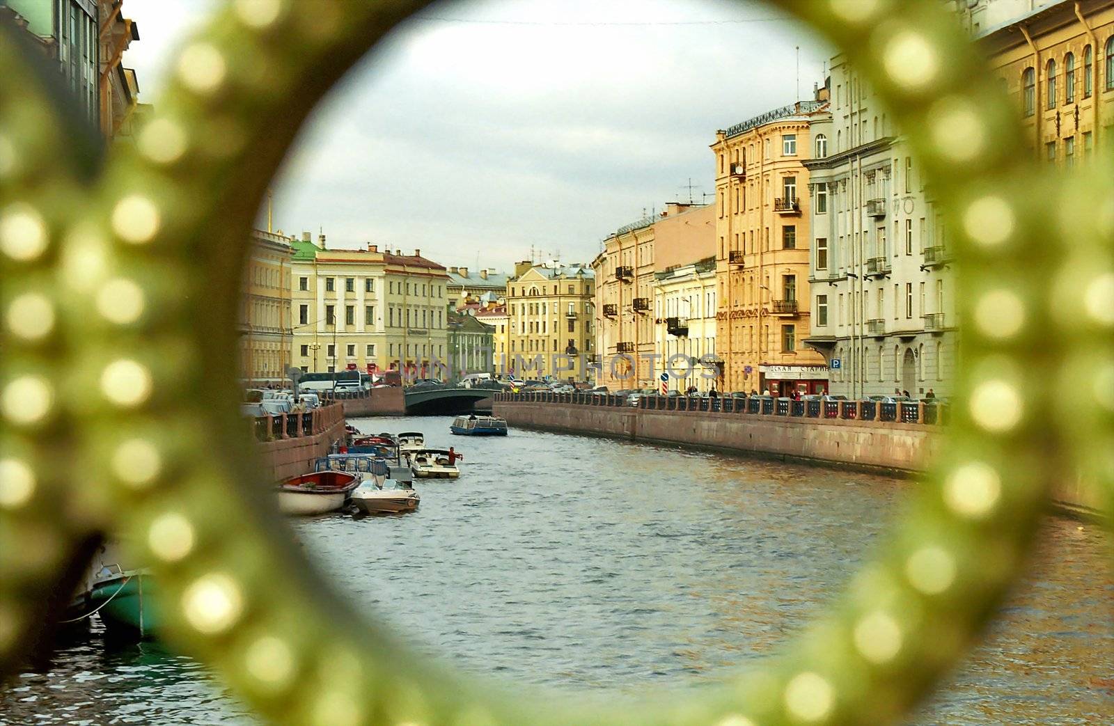City view through the circle decoration of the bridge