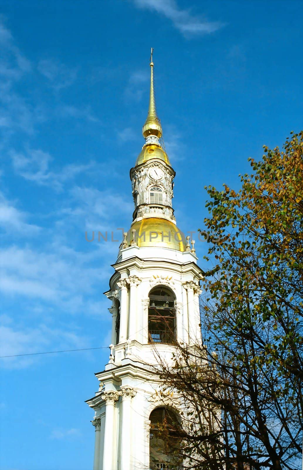 Bell tower against blue sky by mulden