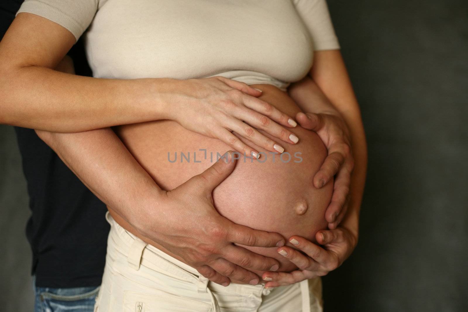 The pregnant woman on the ninth month. The child will be born one of these days