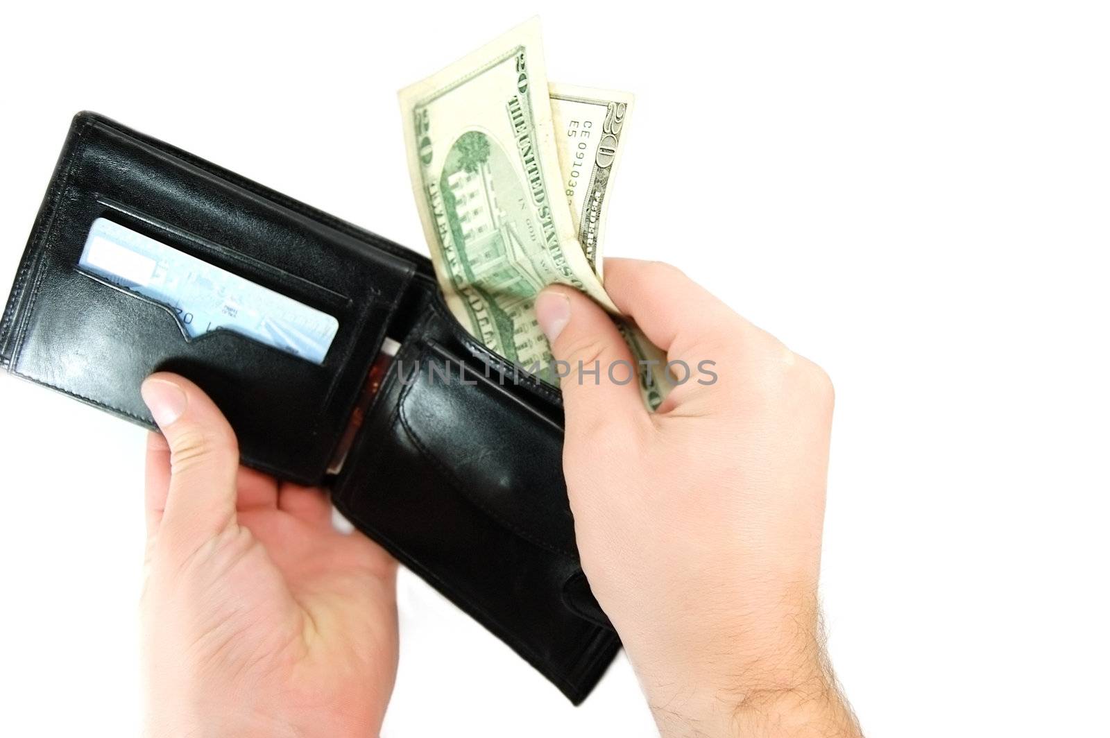 Male hands taking dollars from black leather