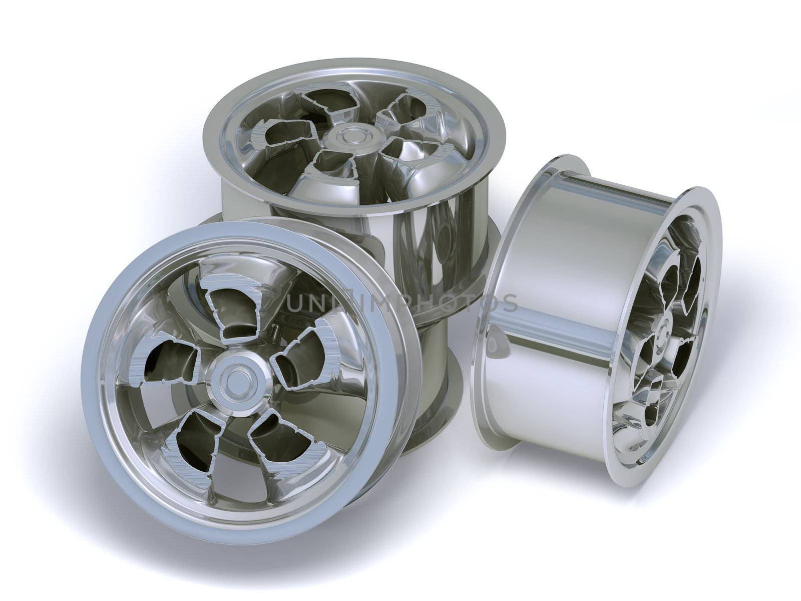 Four chromed rims with cutting branchs on a white background