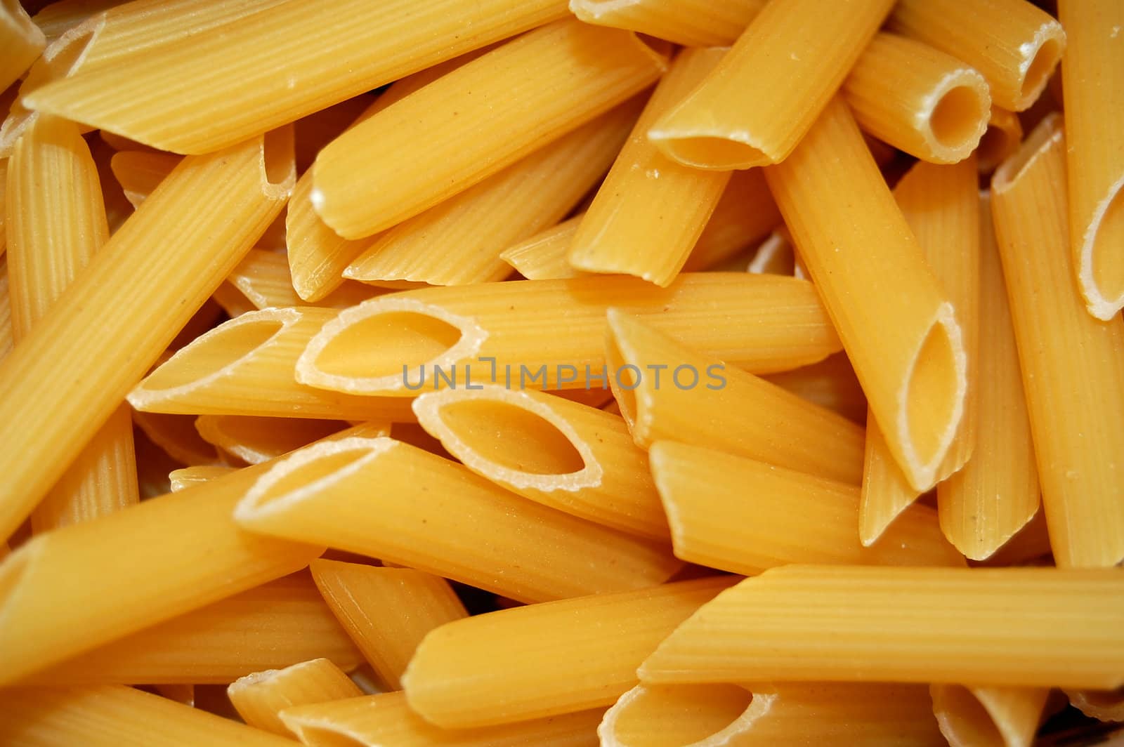 Penne pasta background pattern.